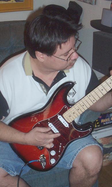 mikeandguitar2.jpg